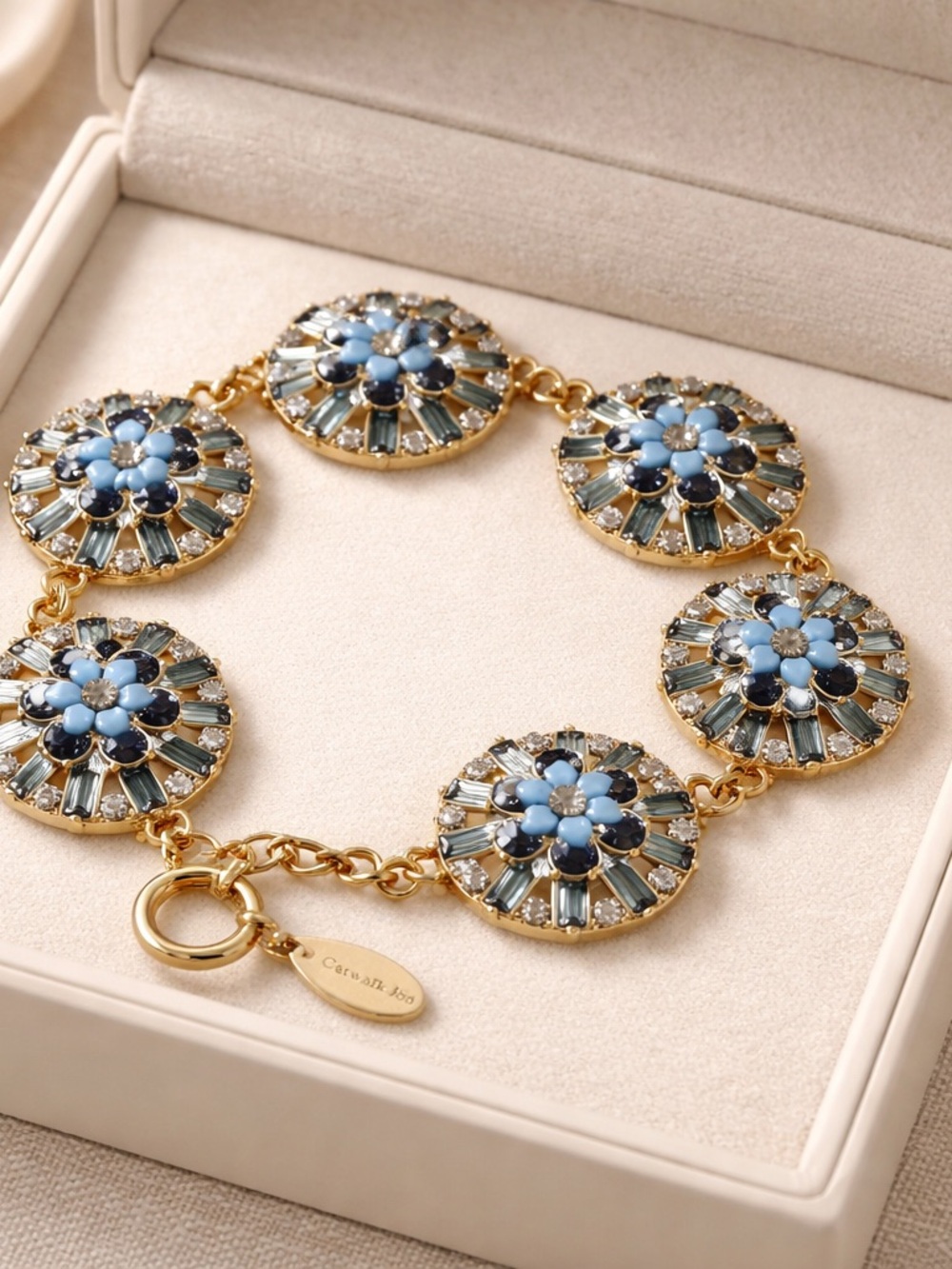 Gold Floral Medallion Bracelet with Blue Accents